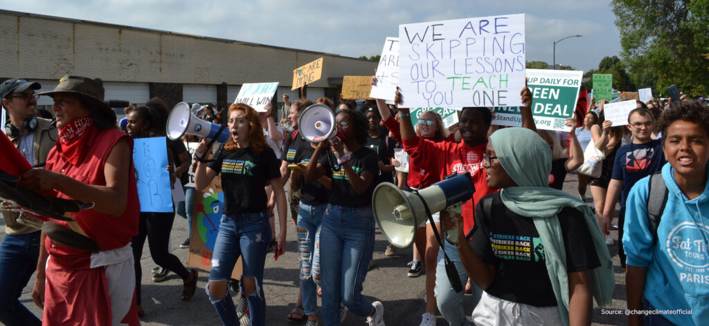 people-marching-climate-strike-changeclimateofficial