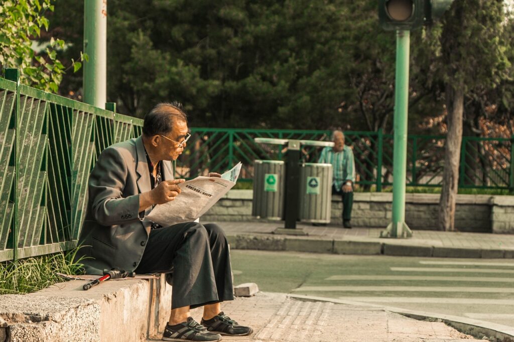 old-man-reading-how-to-use-communication-in-advocacy